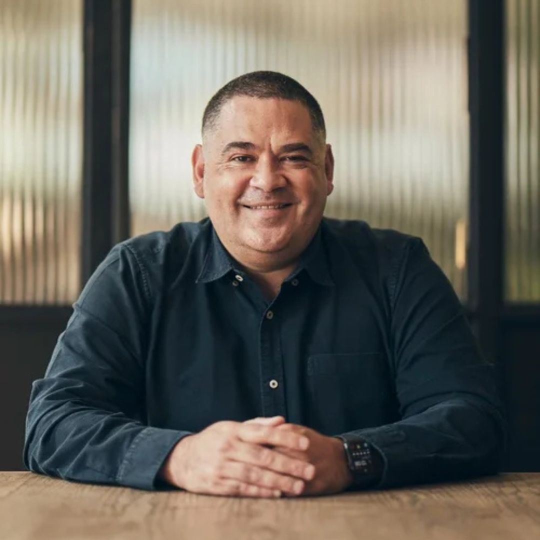 Headshot of Brad Welsh who has short, brown hair and wears a dark blue button-down shirt.