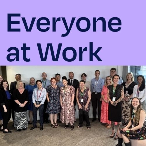 Everyone at Work title over photo of Revenue NSW's program participants standing in a line