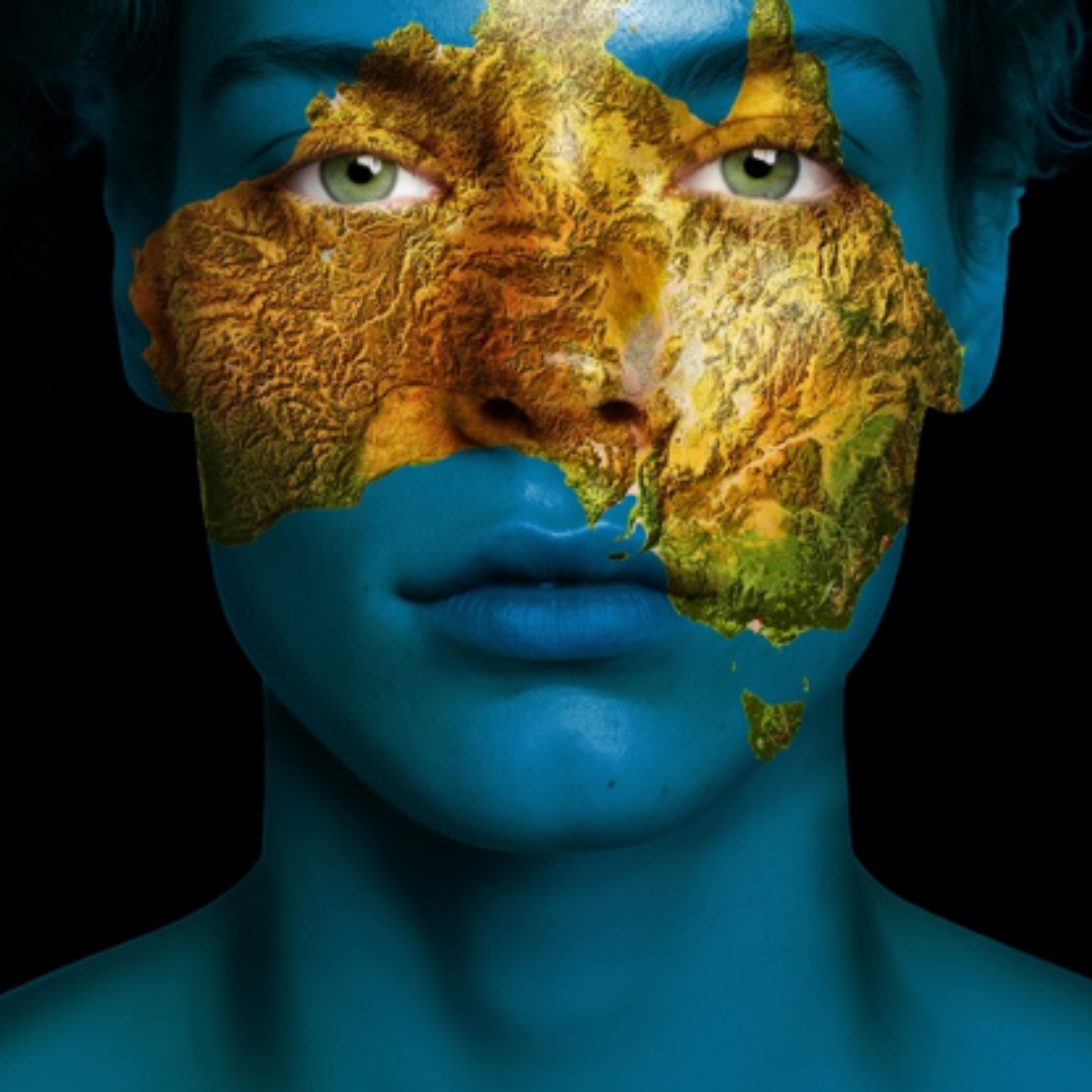 Blue face with map of Australia in green and yellow over the face